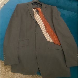 Two button suit with two ties